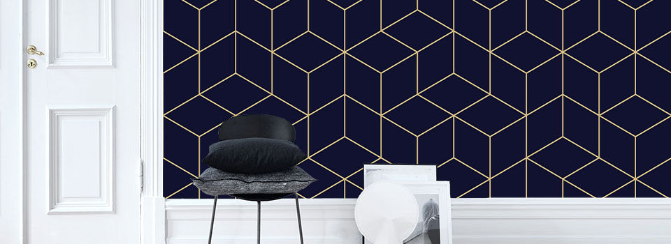 A bold, geometric, navy, and gold wallpaper