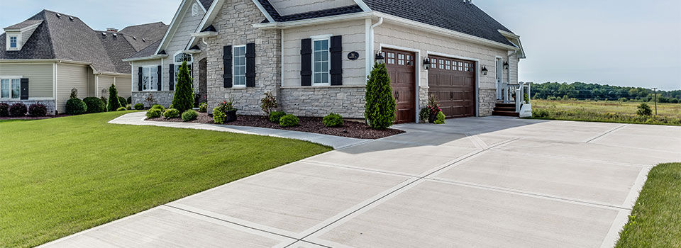 Gorgeous home with lots of curb appeal. Three car garage with wide driveway