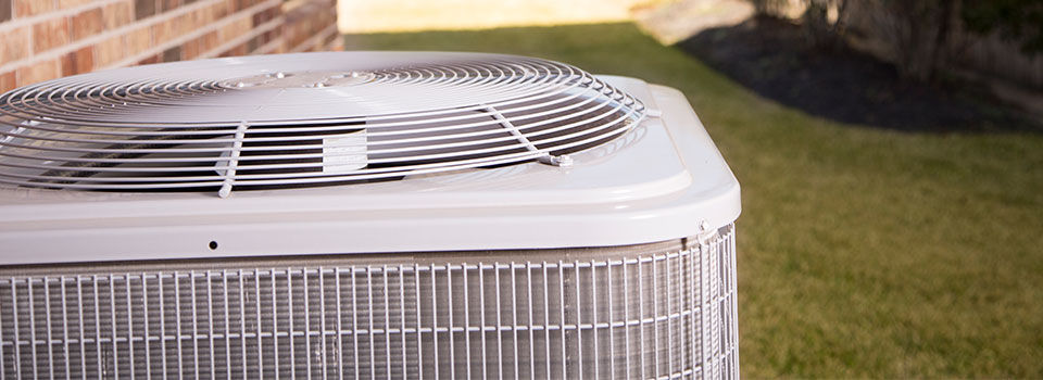 Close-up of an HVAC outside of a house