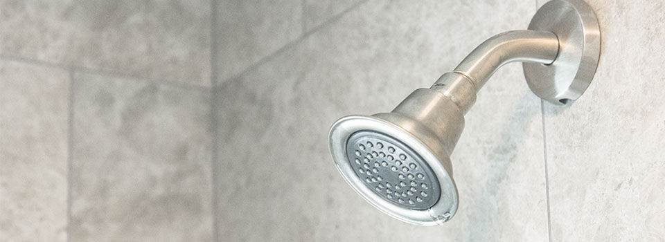 A close-up of a fixed shower head