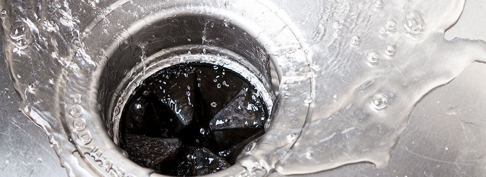 Stainless steal kitchen sink with water drops