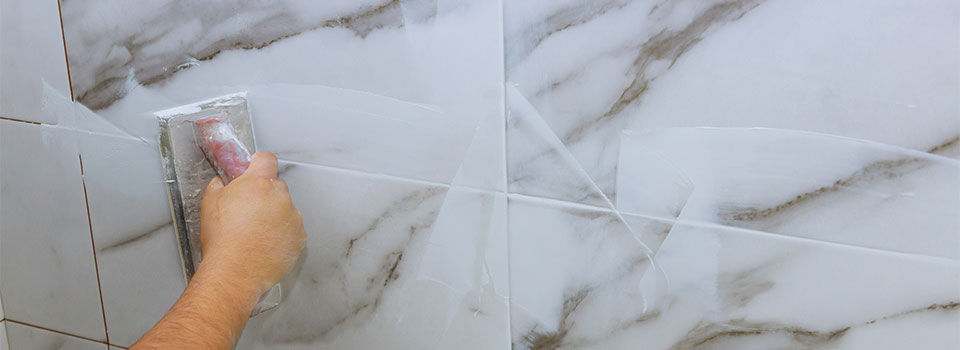 Regrouting marble tile in a shower