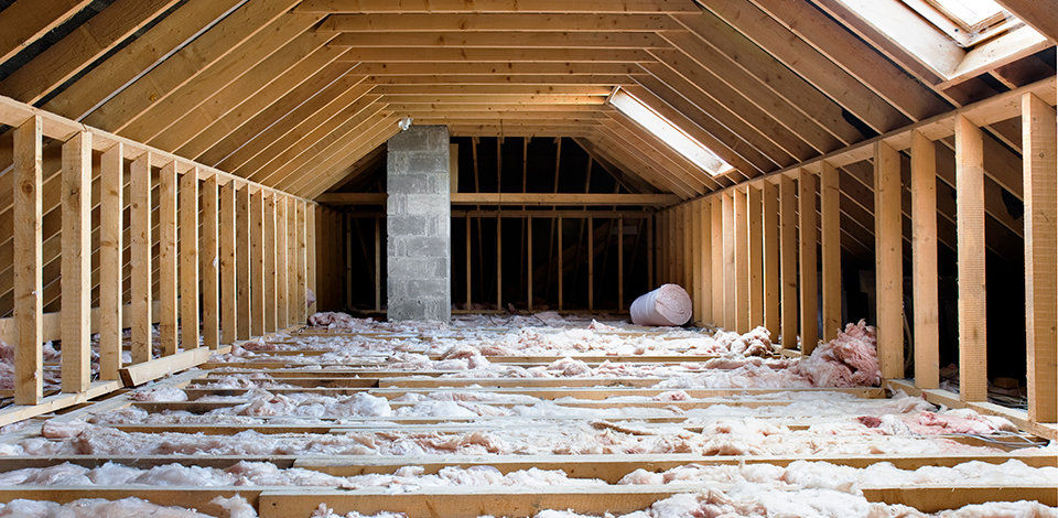 An open attic with insulation