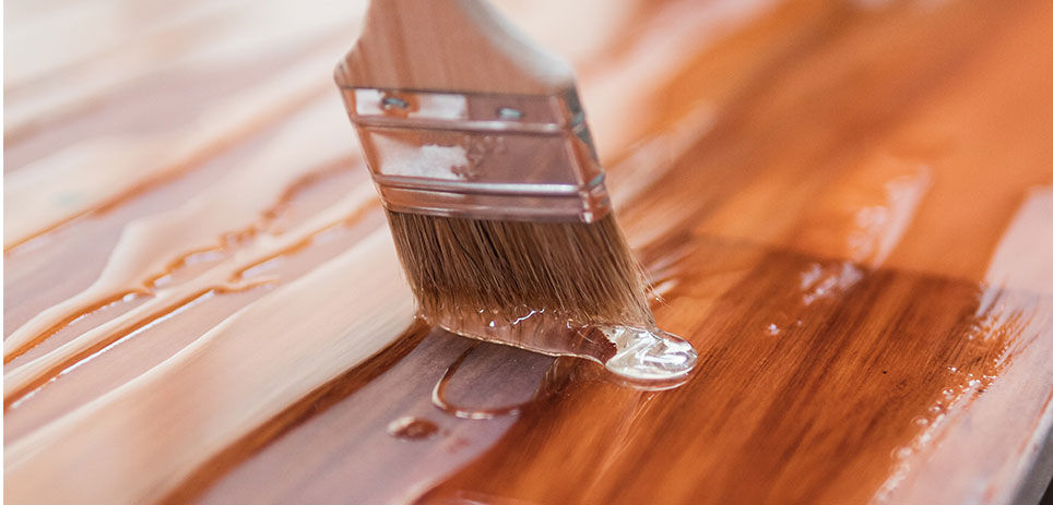 Applying a sealant to stained wood