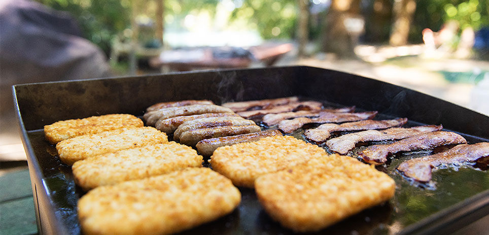 Breakfast cooking on griddle