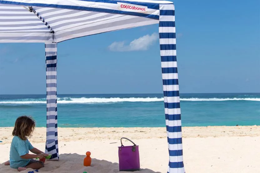spacious CoolCabana beach tent providing shade and comfort for a perfect beach day..