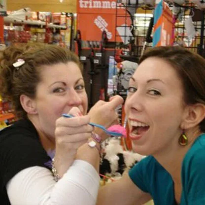 Patti and Lisa enjoying frosting