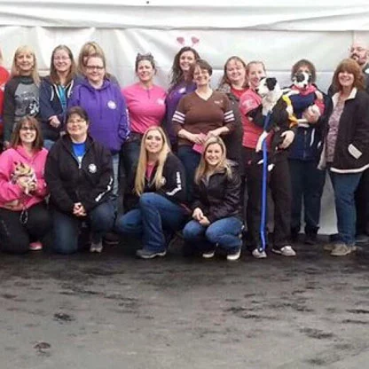 Volunteers at Love Me Because Pet Adoption Event