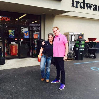 Patti & Dave in front of the store