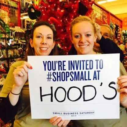 Lisa & Ashley holding up a sign for #shopsmall