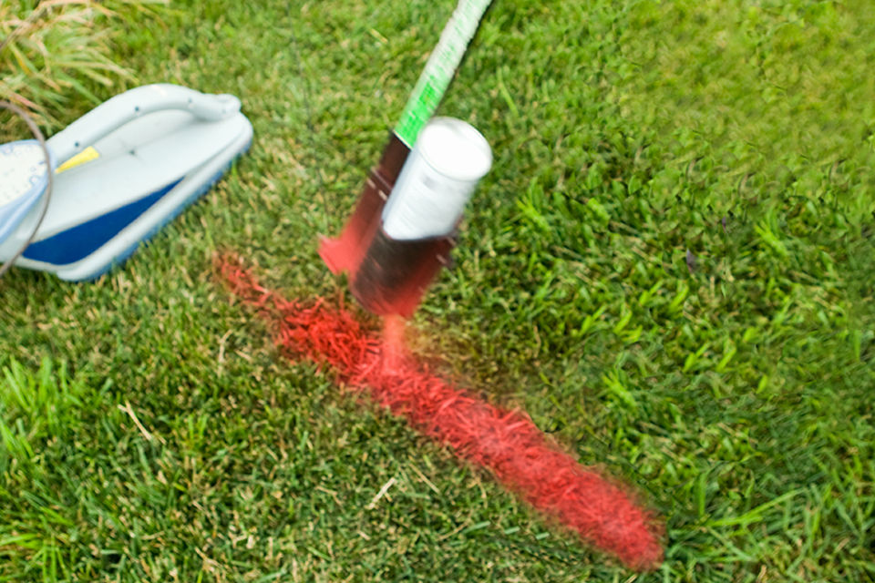 Marking a yard with spray paint