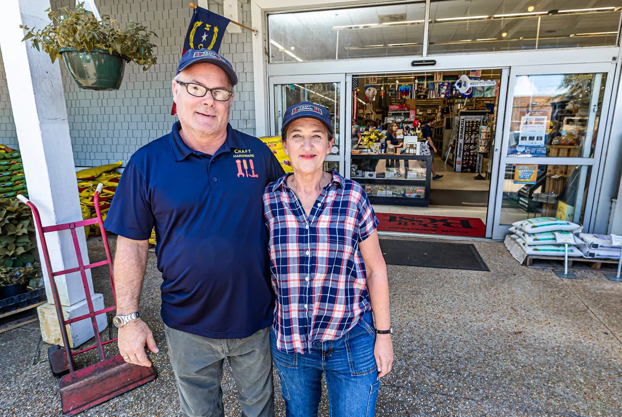 Elise and Eric in front of the store