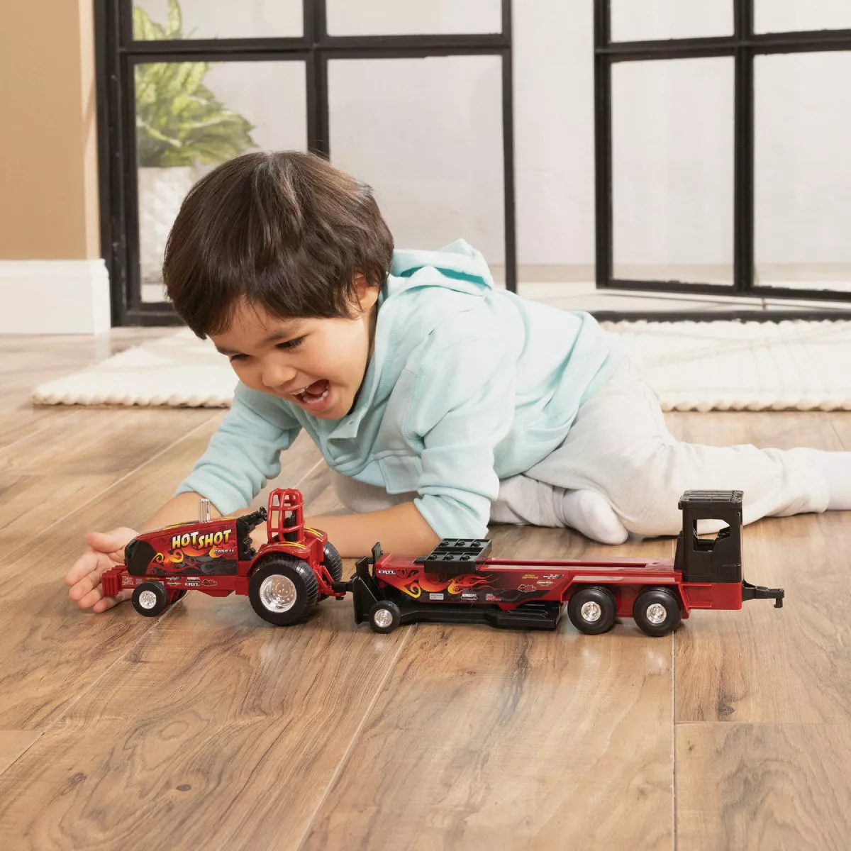 Case IH 1:32 Pull Back Puller Tractor & Sled Toy Set- - photo 2