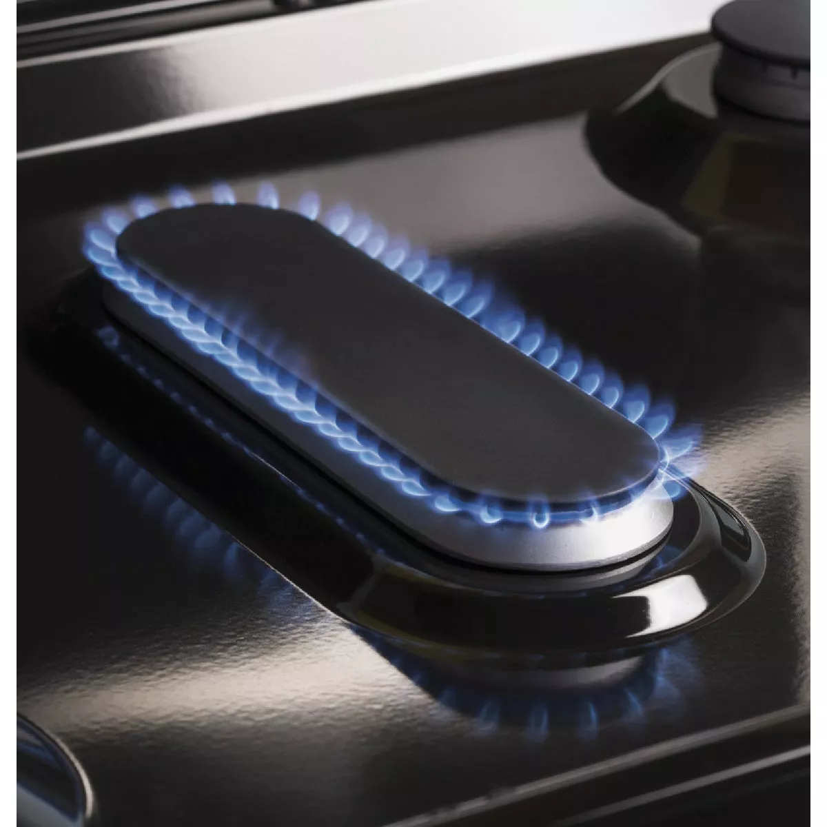 GE 30 In. 5 Cu. Ft. Free-Standing Gas Range with Integrated Griddle, Stainless Steel - photo 4