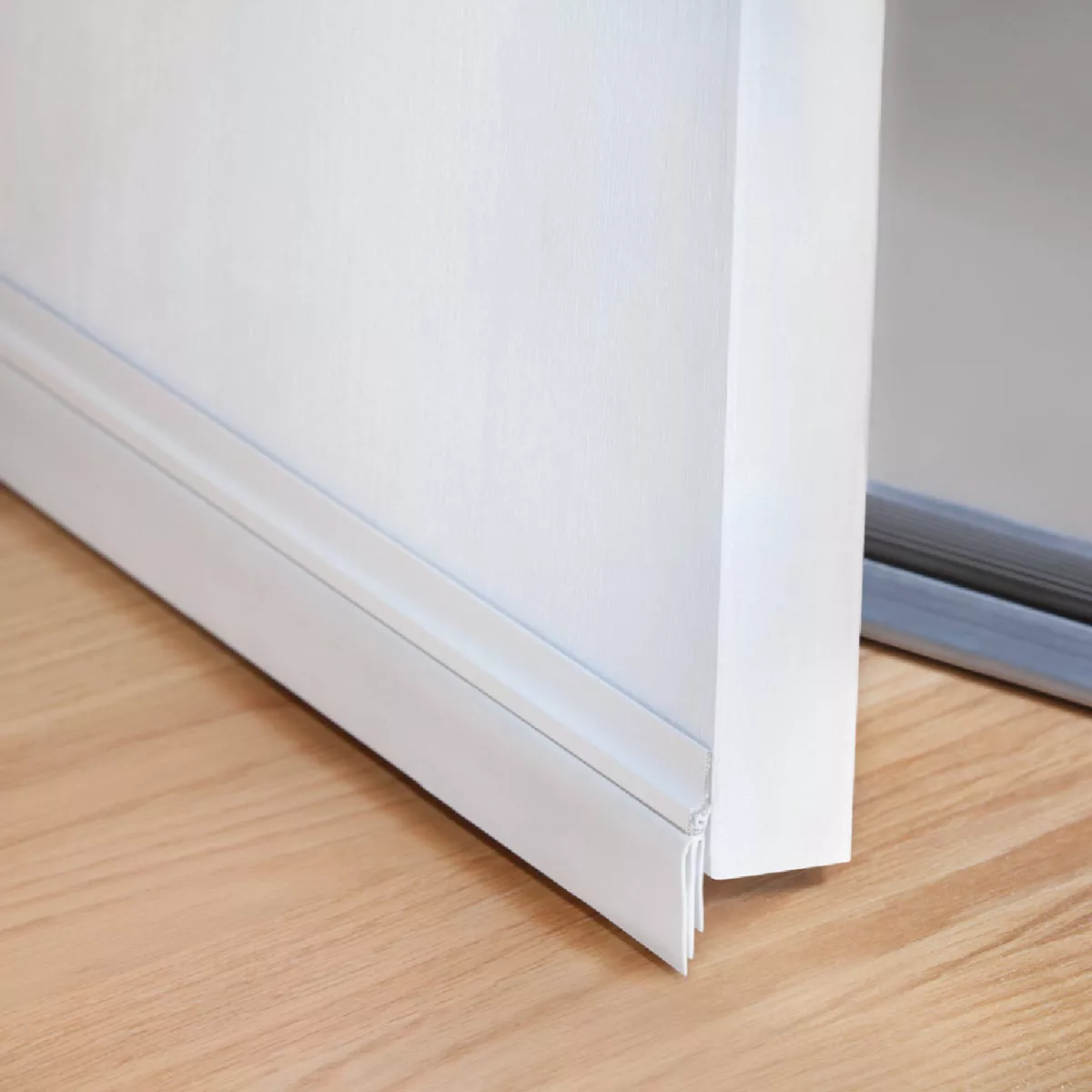 M-D Building Products 36 In. Aluminum and Vinyl CINCH Self-Adhesive Door Sweep, White - photo 2