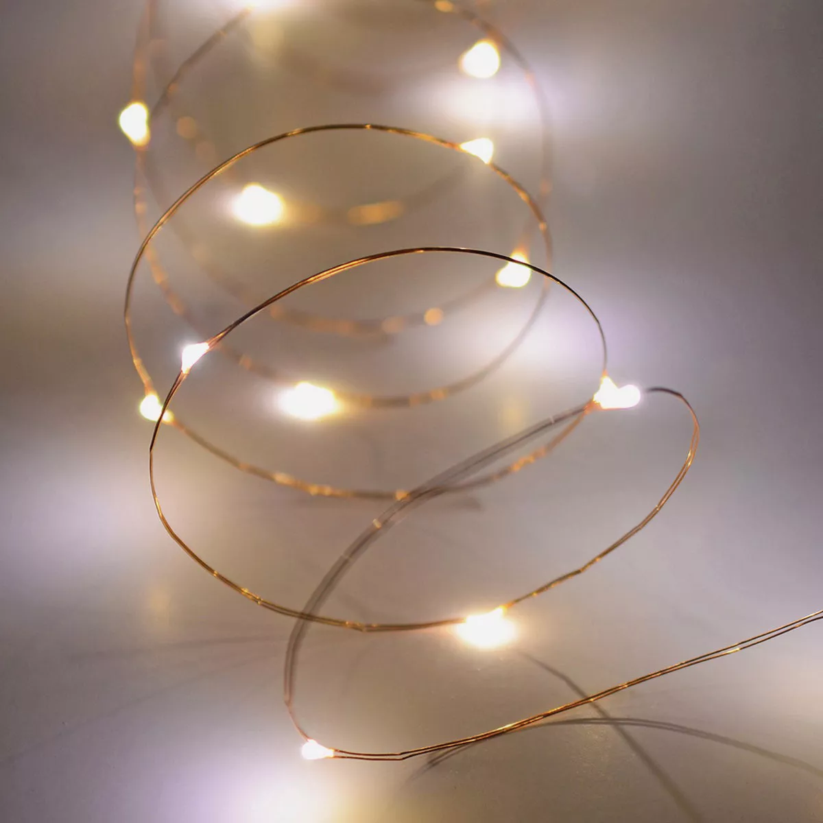 Alpine 10-1/2 Ft. 60-Light Warm White LED Battery Operated Copper String Light Set - photo 5