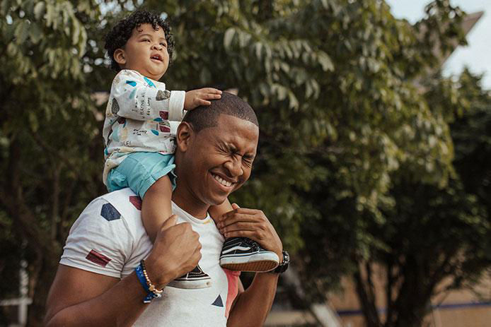 Dad with baby on his shoulders