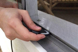 man install mosquito net wire screen on house window protection against insect